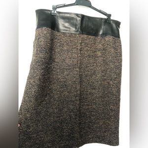 Beautiful pencil skirt size 14. Brownish-black color. Genuine leather top